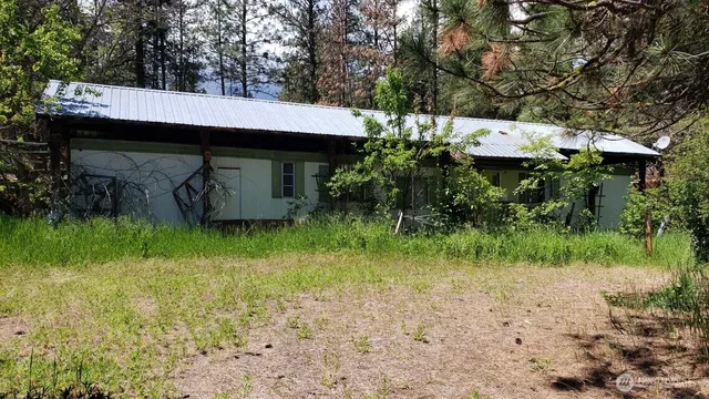 a view of backyard with green space