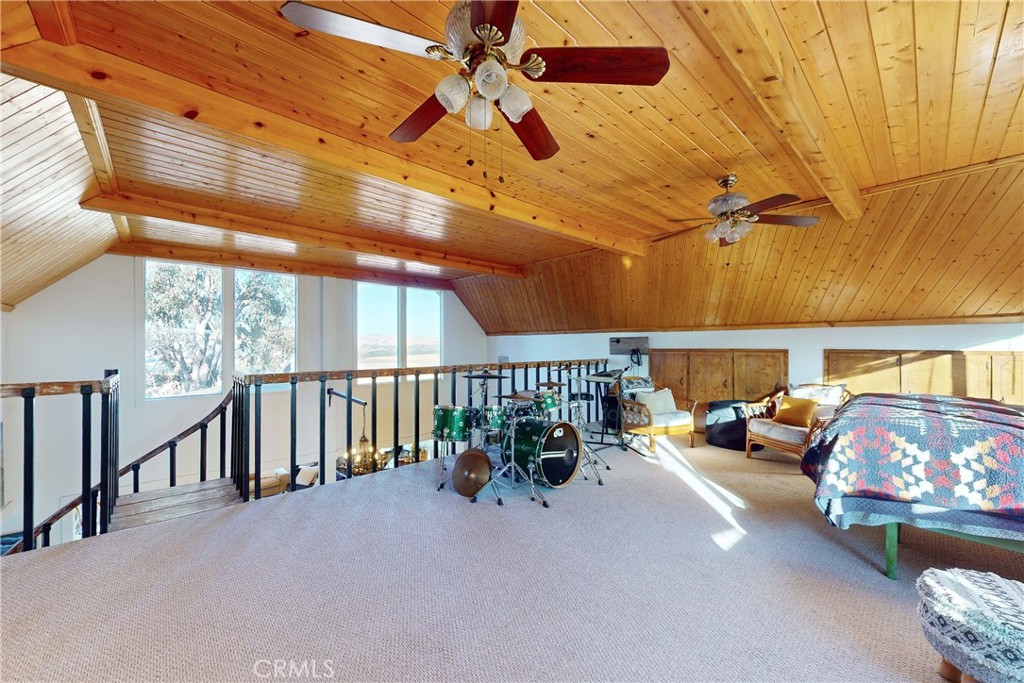 8560 Warren Road Paso Robles, CA 93446 - Photo 12 of 74 a balcony with furniture and a potted plant