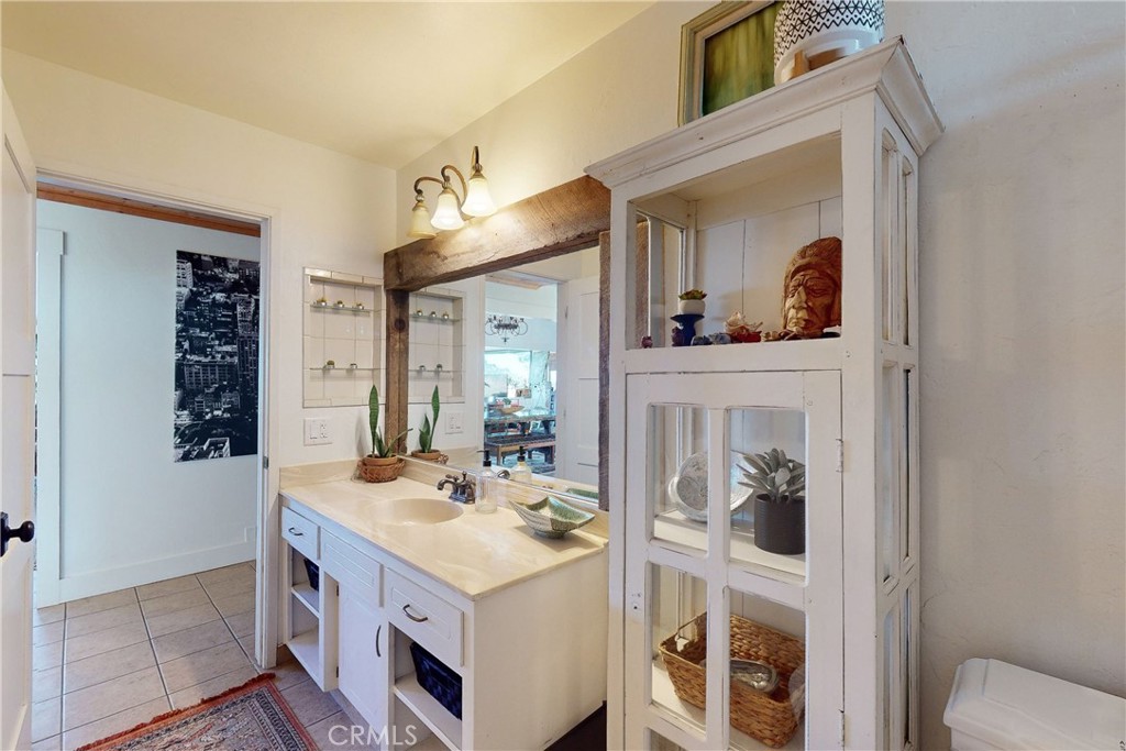 8560 Warren Road Paso Robles, CA 93446 - Photo 23 of 74 a living room with furniture and a fireplace