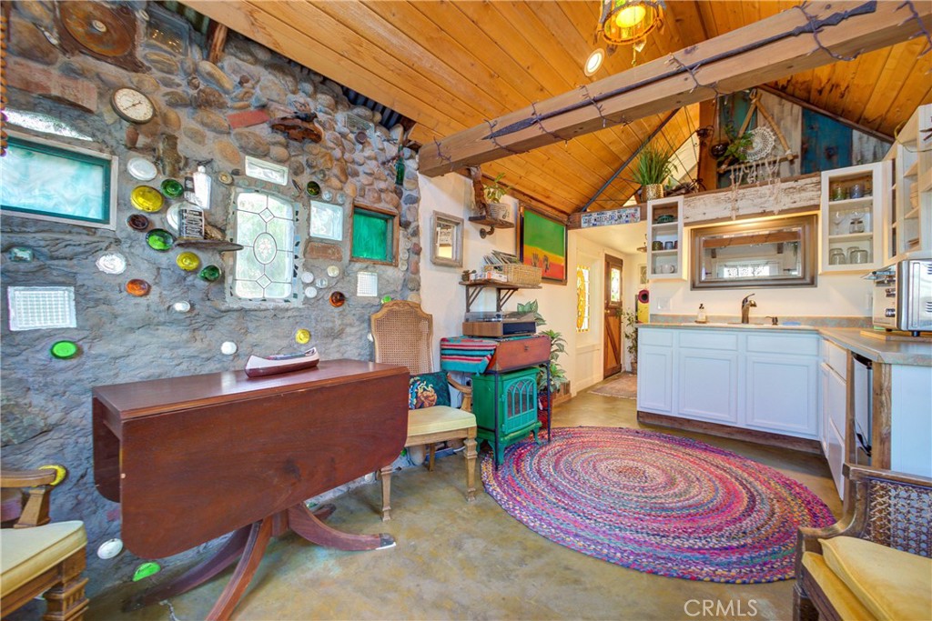 8560 Warren Road Paso Robles, CA 93446 - Photo 39 of 74 a room with furniture and a fireplace