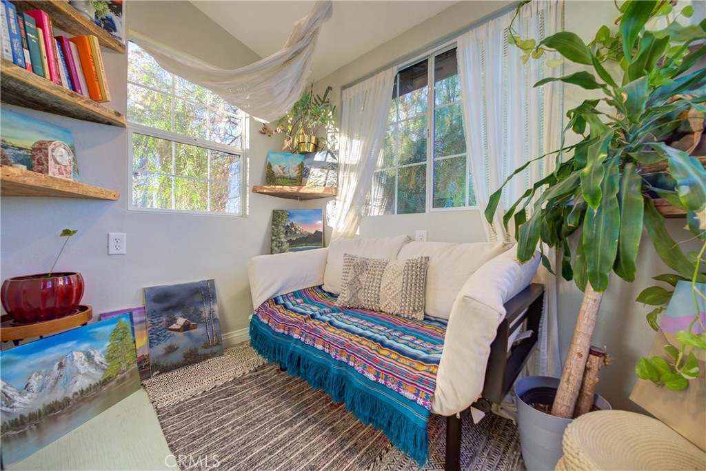 8560 Warren Road Paso Robles, CA 93446 - Photo 47 of 74 a living room with furniture and a potted plant