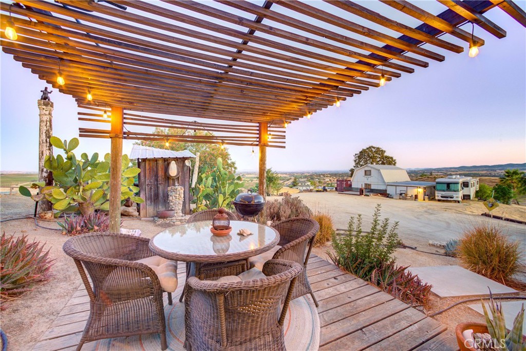 8560 Warren Road Paso Robles, CA 93446 - Photo 48 of 74 a view of a patio with a table and chairs and couches
