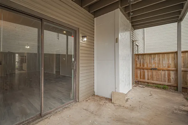 a view of a porch of a house