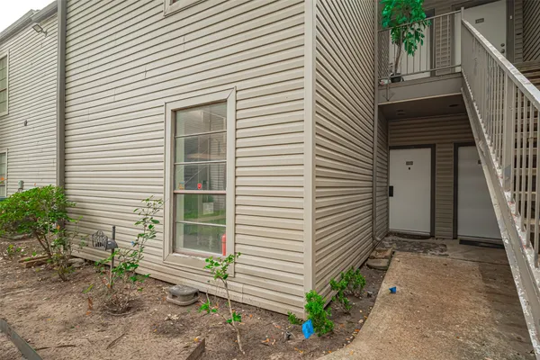 a front view of a house with a garage