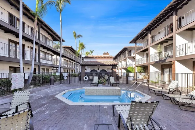 a view of a building with sitting area