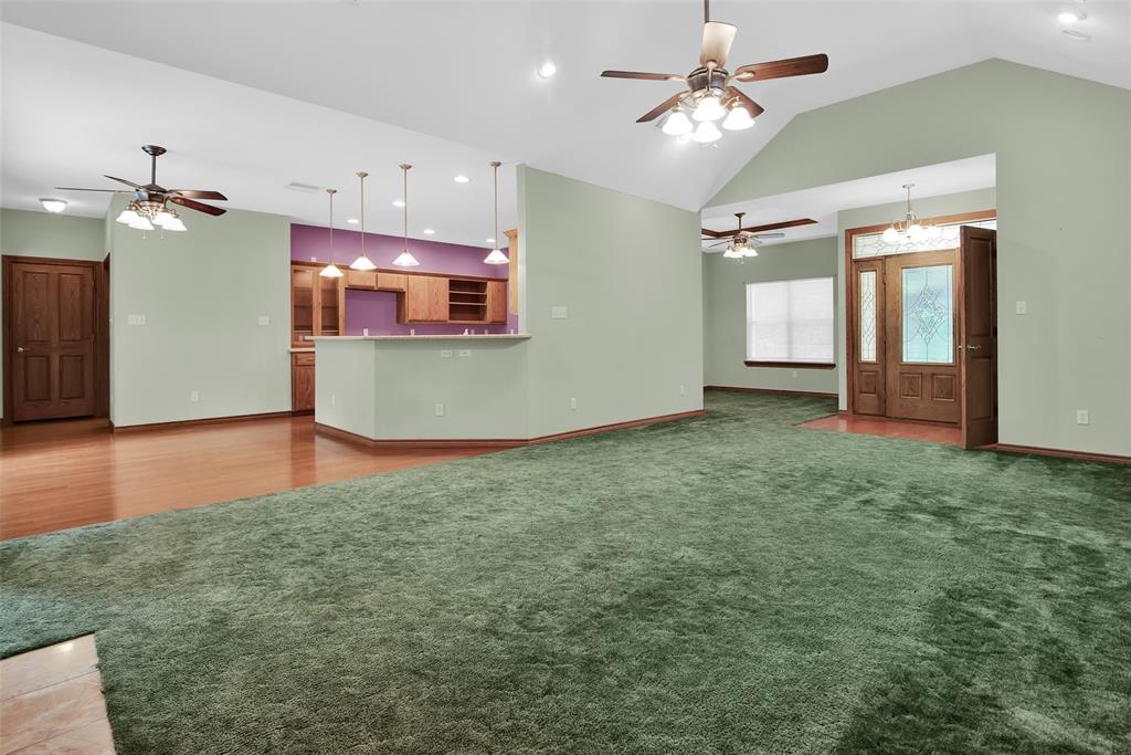 2255 Davy Lane Denison, TX 75020 - Photo 12 of 37 an empty room with fan and windows