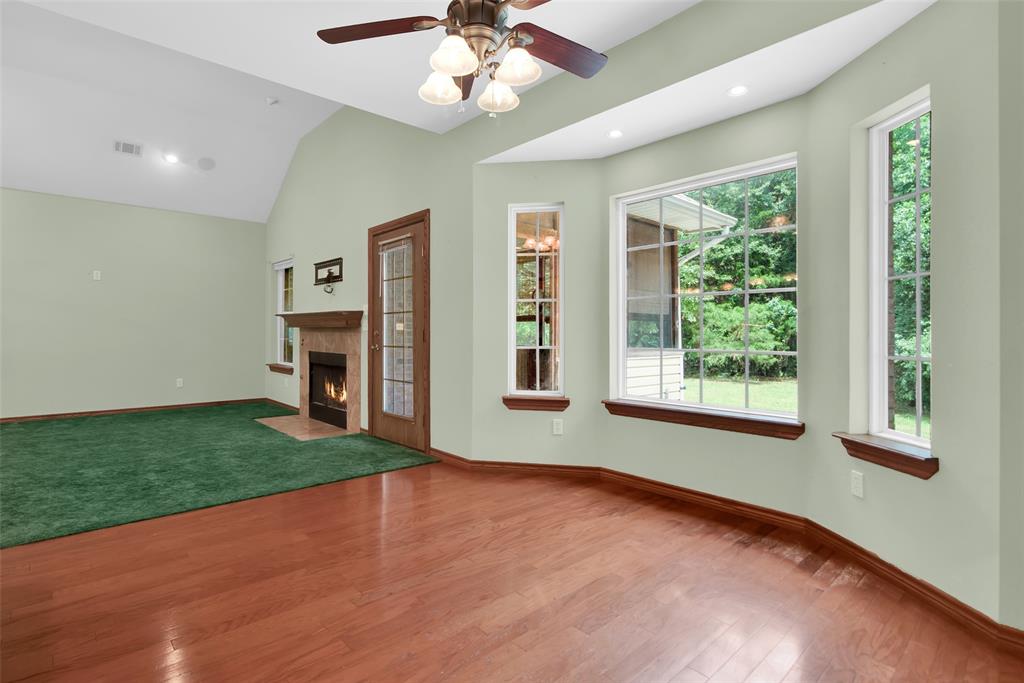 2255 Davy Lane Denison, TX 75020 - Photo 14 of 37 a view of an empty room with a window and kitchen view