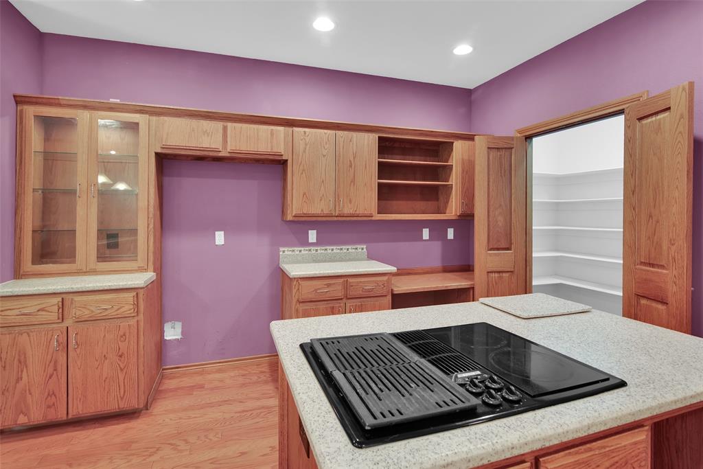 2255 Davy Lane Denison, TX 75020 - Photo 20 of 37 a kitchen with granite countertop stove and cabinets