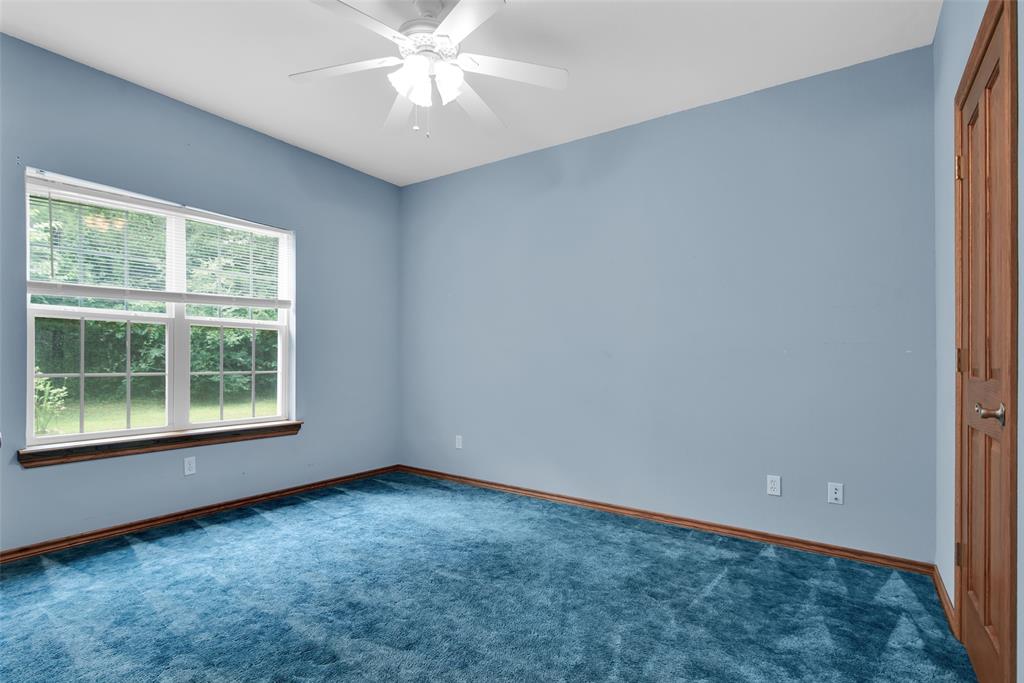 2255 Davy Lane Denison, TX 75020 - Photo 27 of 37 an empty room with a window