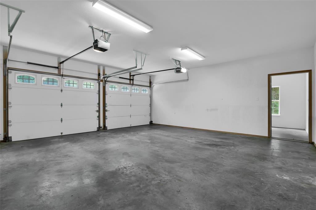 2255 Davy Lane Denison, TX 75020 - Photo 33 of 37 an empty room with fan and windows