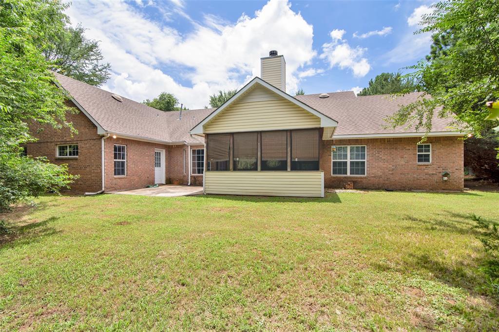 2255 Davy Lane Denison, TX 75020 - Photo 34 of 37 a view of a house with backyard and garden