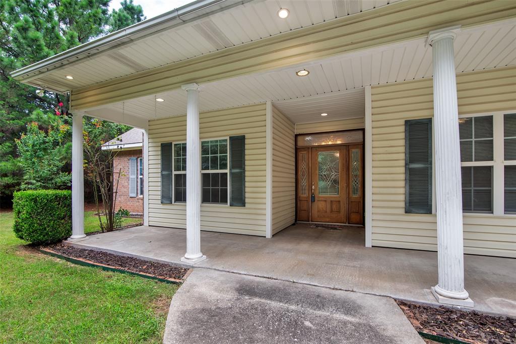 2255 Davy Lane Denison, TX 75020 - Photo 4 of 37 a view of a house with a porch