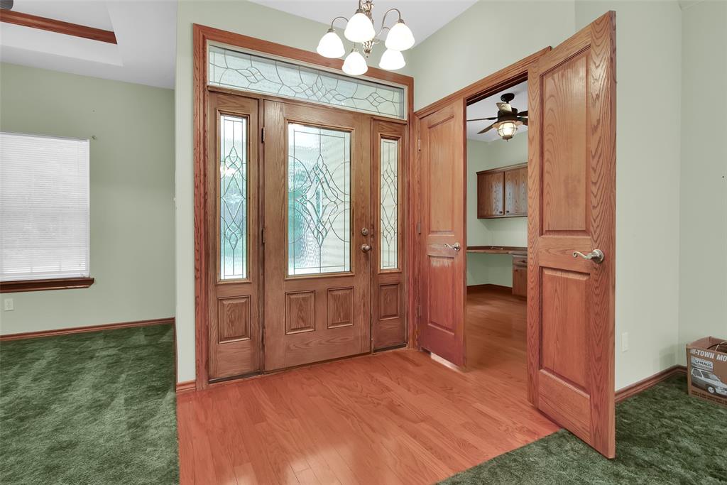 2255 Davy Lane Denison, TX 75020 - Photo 5 of 37 a view of a hallway with closet and chandelier fan