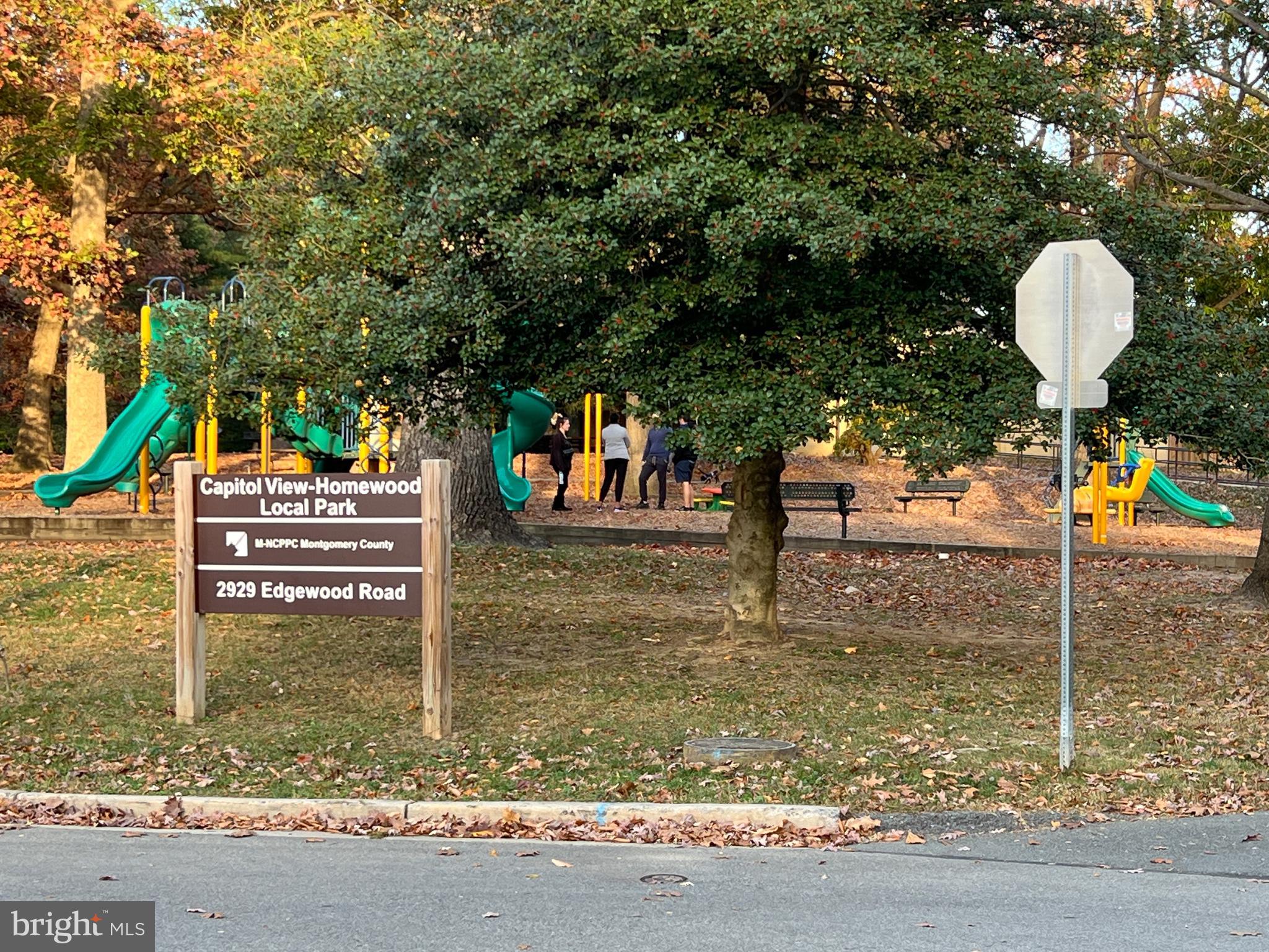 3000 Edgewood Road Kensington, MD 20895 - Photo 28 of 28 a backyard of a house with barbeque oven table and chairs