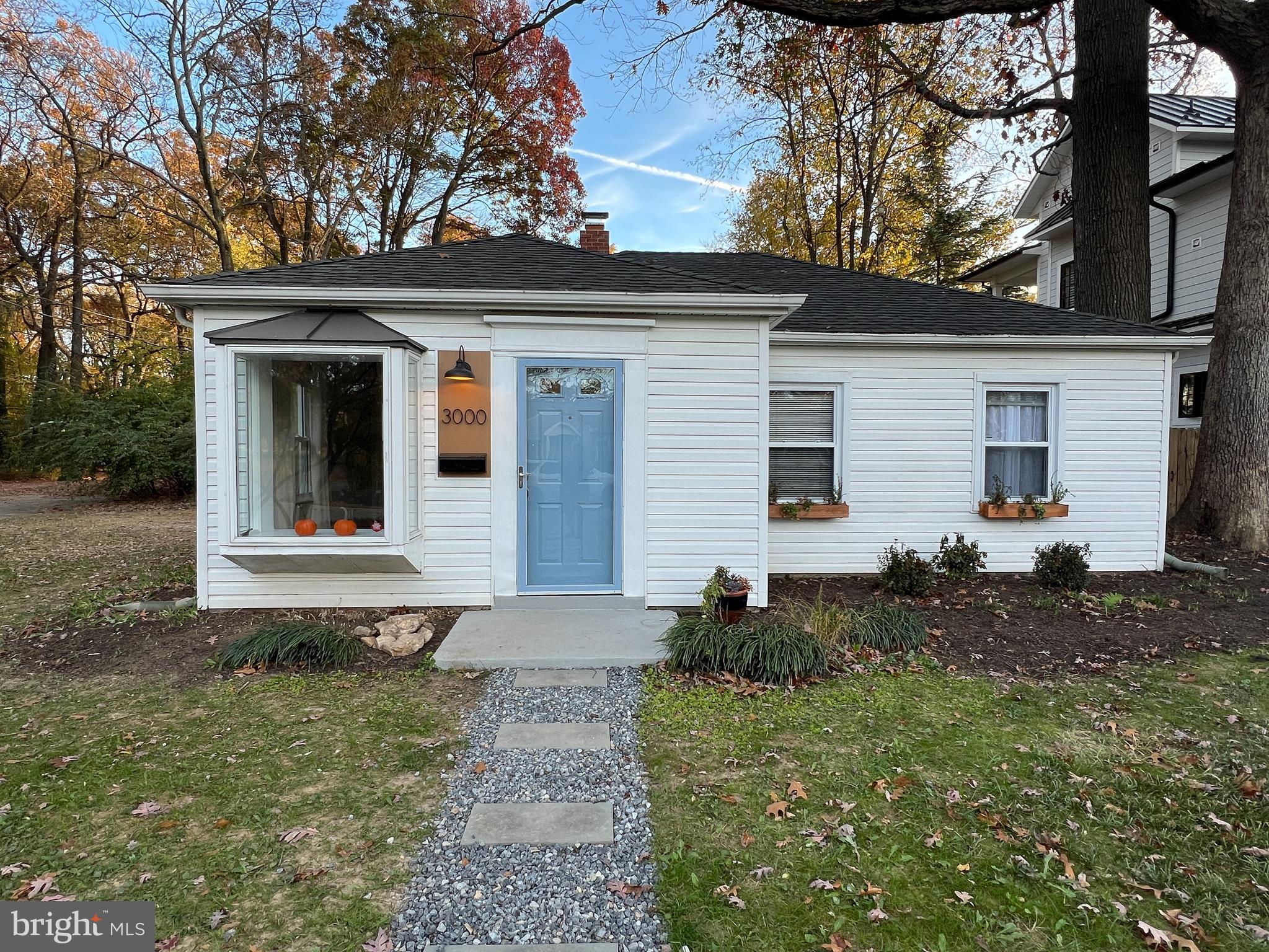 3000 Edgewood Road Kensington, MD 20895 - Photo 3 of 28 a front view of a house with a yard