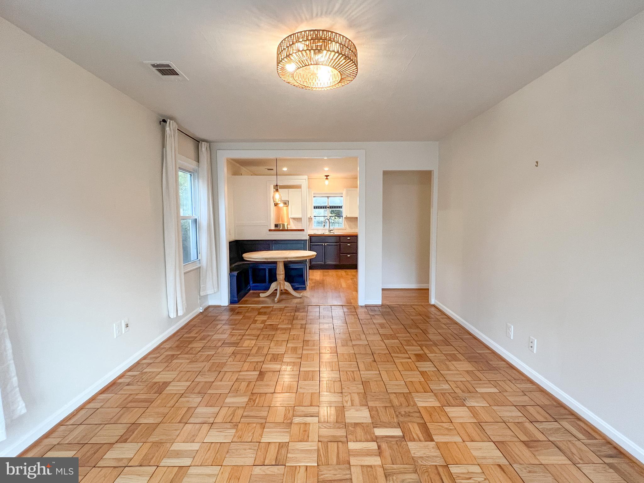 3000 Edgewood Road Kensington, MD 20895 - Photo 5 of 28 a view of a livingroom with furniture window and wooden floor