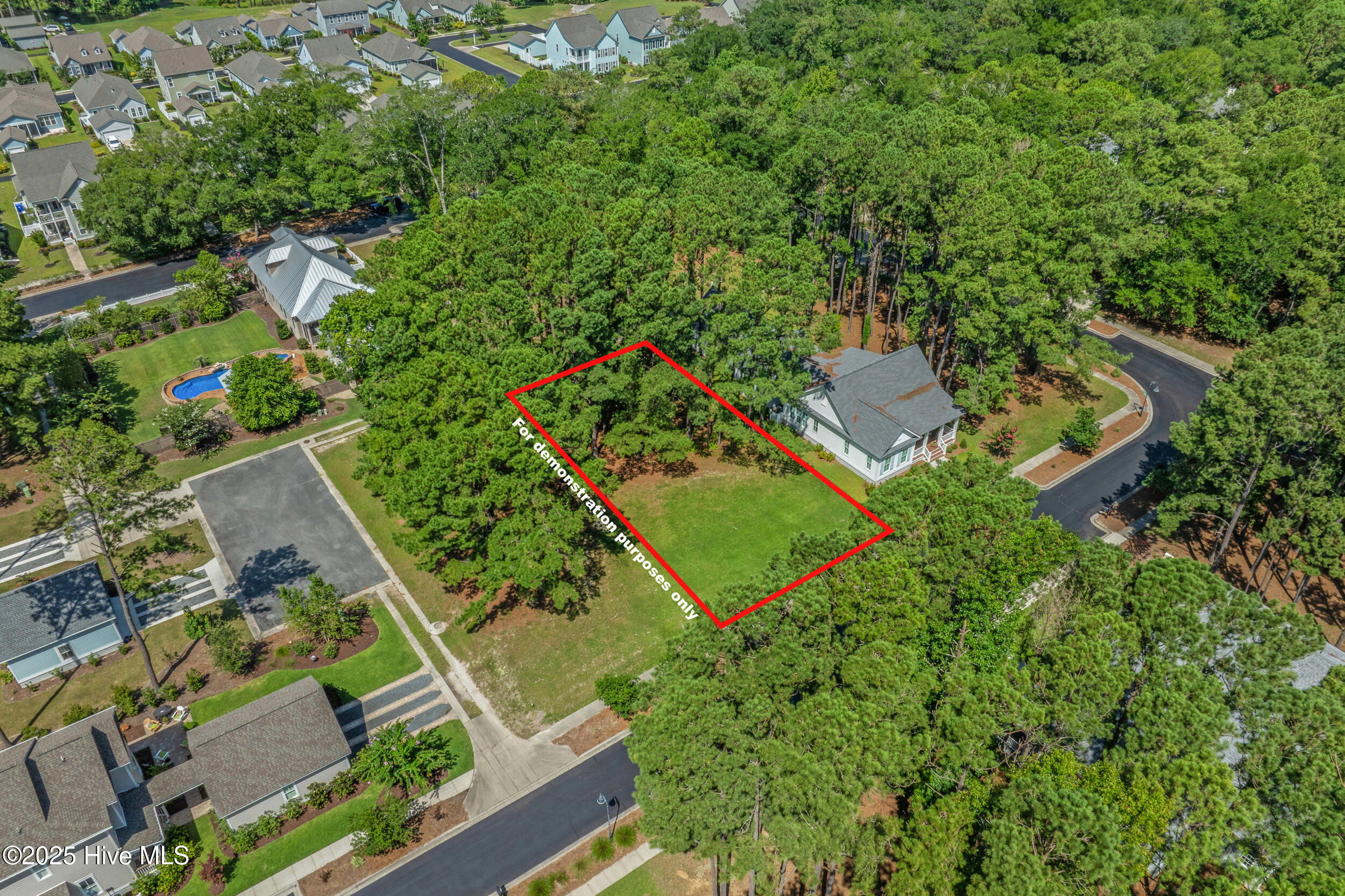 9266 West Lake Road Calabash, NC 28467 - Photo 4 of 15 Devaun Park is a charming, neighbor-focused community situated along the scenic Calabash River, where Charleston-style homes overlook inviting parks and gathering spaces, all linked by tree-lined sidewalks. The outlined area in red is NOT for survey purposes.