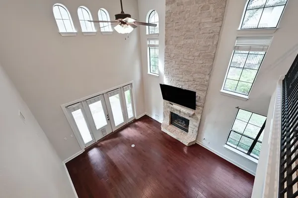 a large bathroom with a sink and a large mirror