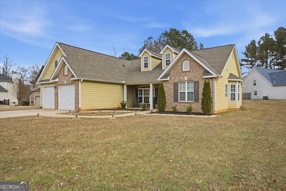 1201 Pendley Point Hampton, GA 30228 - Photo 2 of 23 a house with a outdoor space