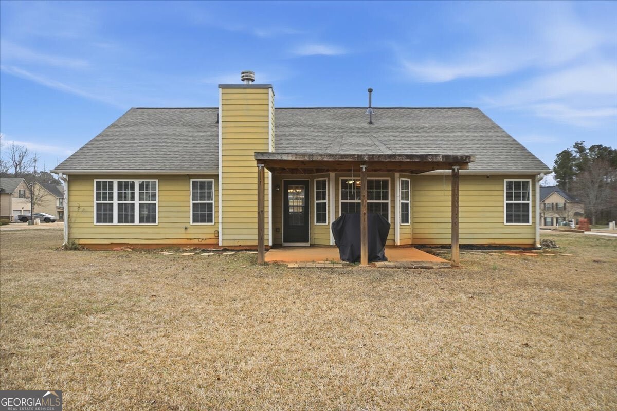 1201 Pendley Point Hampton, GA 30228 - Photo 22 of 23 a house with a outdoor space