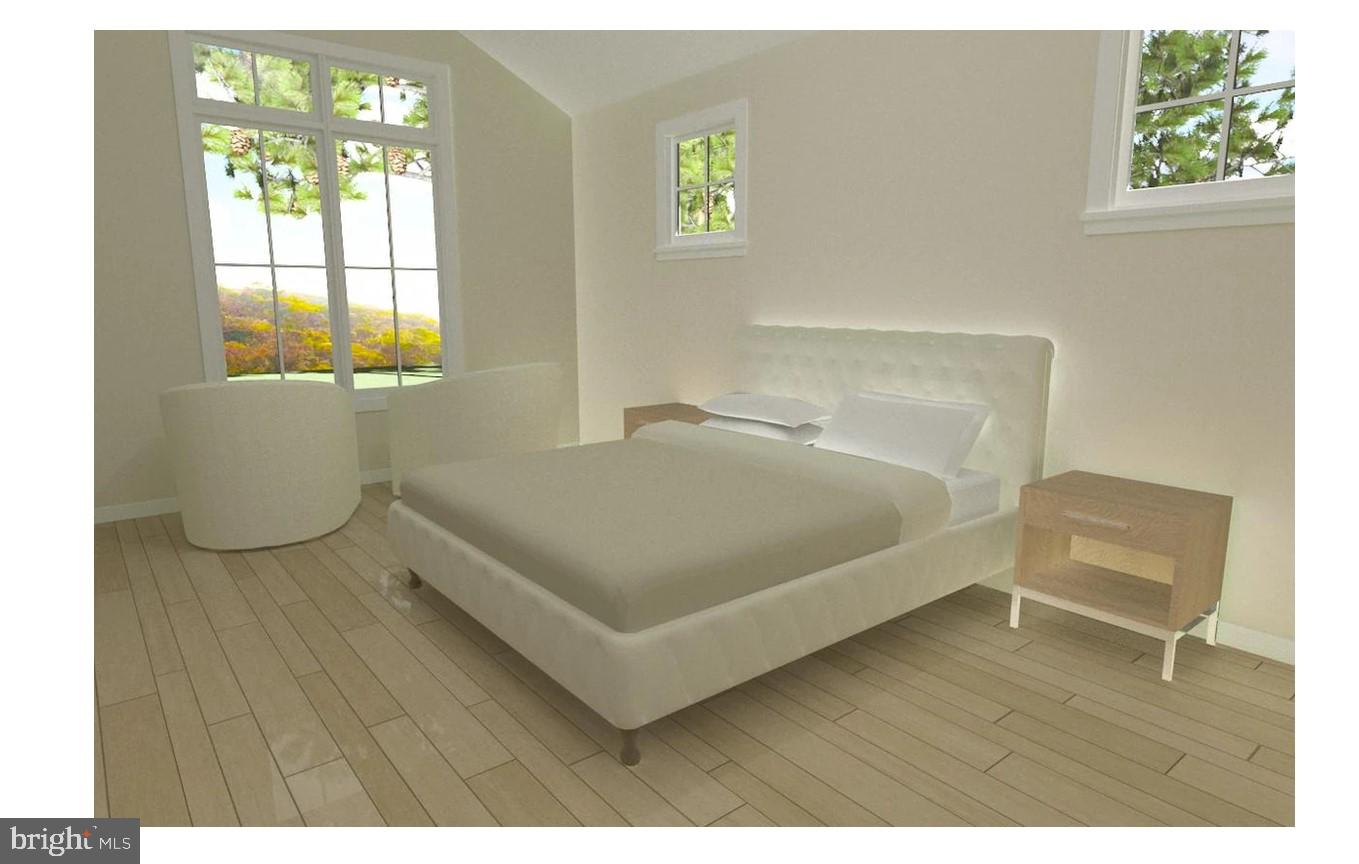 57 Walnut Ridge Grantsville, MD 21536 - Photo 4 of 8 a bedroom with a bed and a table