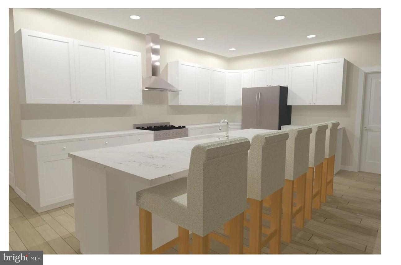 57 Walnut Ridge Grantsville, MD 21536 - Photo 5 of 8 a kitchen with stainless steel appliances granite countertop a sink a refrigerator and a microwave