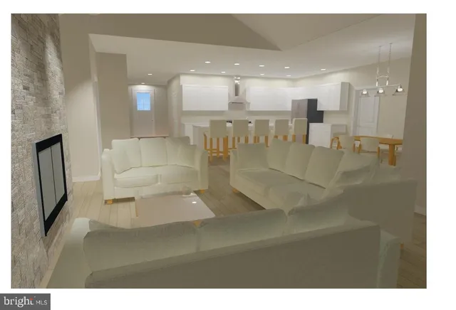 a view of a living room with a kitchen island furniture