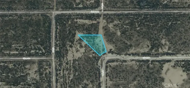 a close view of water heater and wooden floor