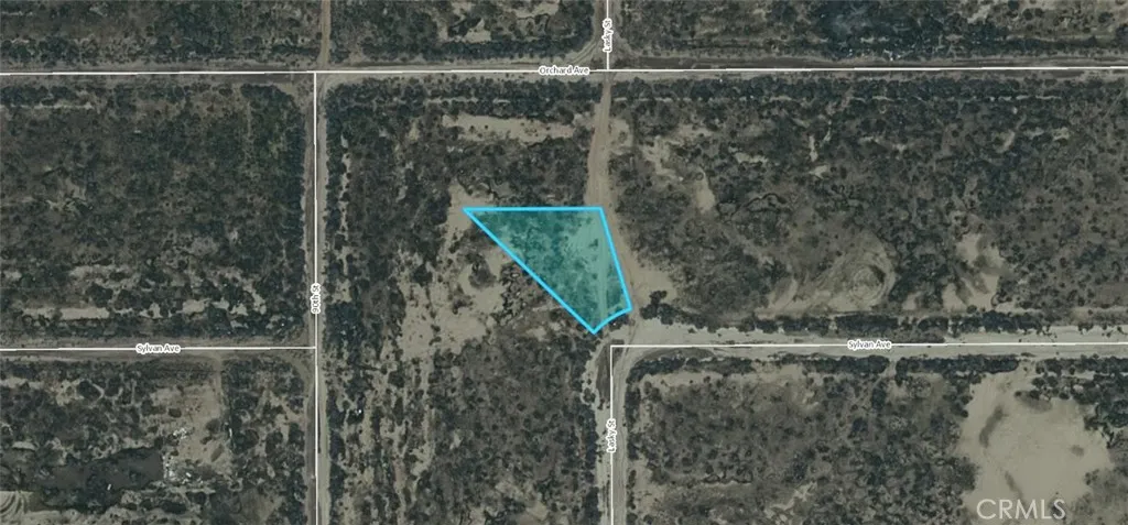 a close view of water heater and wooden floor