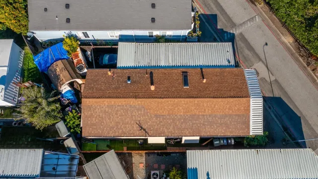 an aerial view of a house with a garden