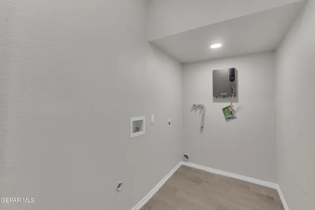 a view of a dry space with a house