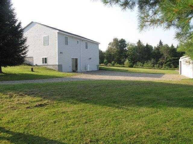 60 Thompson Road Dedham, ME 04429 - Photo 4 of 22 Exterior Back.