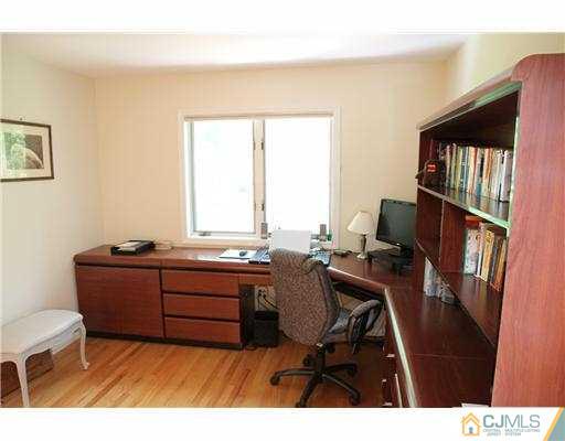 80 Ellmyer Road Edison, NJ 08820 - Photo 15 of 25 a room with furniture and a window