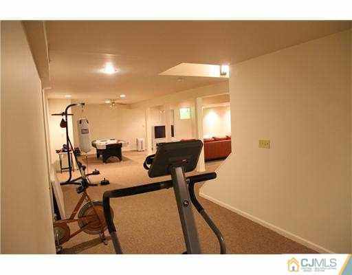 80 Ellmyer Road Edison, NJ 08820 - Photo 19 of 25 a view of a room with furniture and a potted plant
