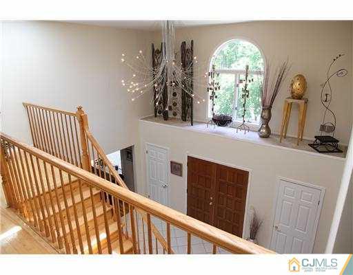 80 Ellmyer Road Edison, NJ 08820 - Photo 3 of 25 a view of entryway and hall with a window