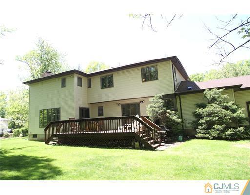 80 Ellmyer Road Edison, NJ 08820 - Photo 25 of 25 a front view of a house with a yard