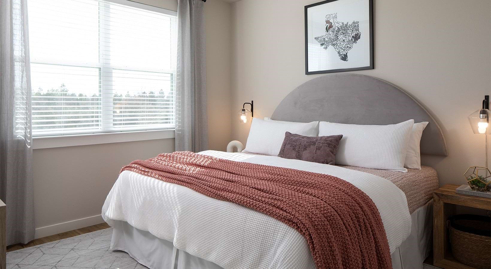 22540 Merchants Way, Unit 11113 Katy, TX 77449 - Photo 6 of 16 a bedroom with a bed and a window