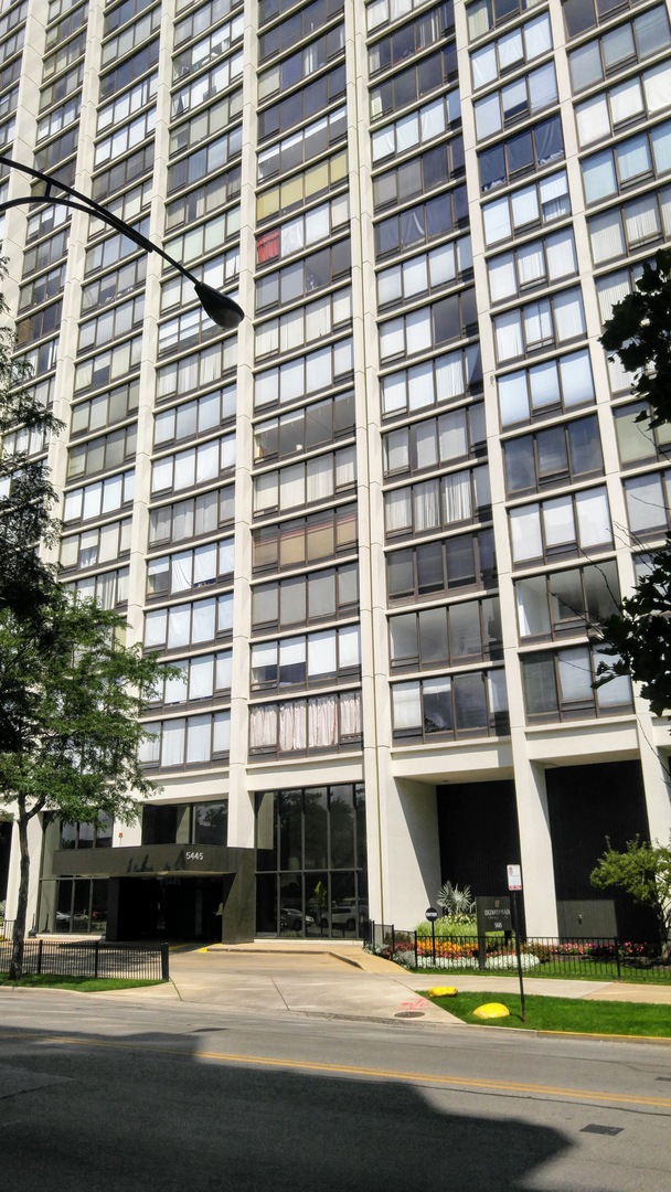 5445 North Sheridan Road, Unit 2504 Chicago, IL 60640 - Photo 1 of 37 a view of a building and car parked