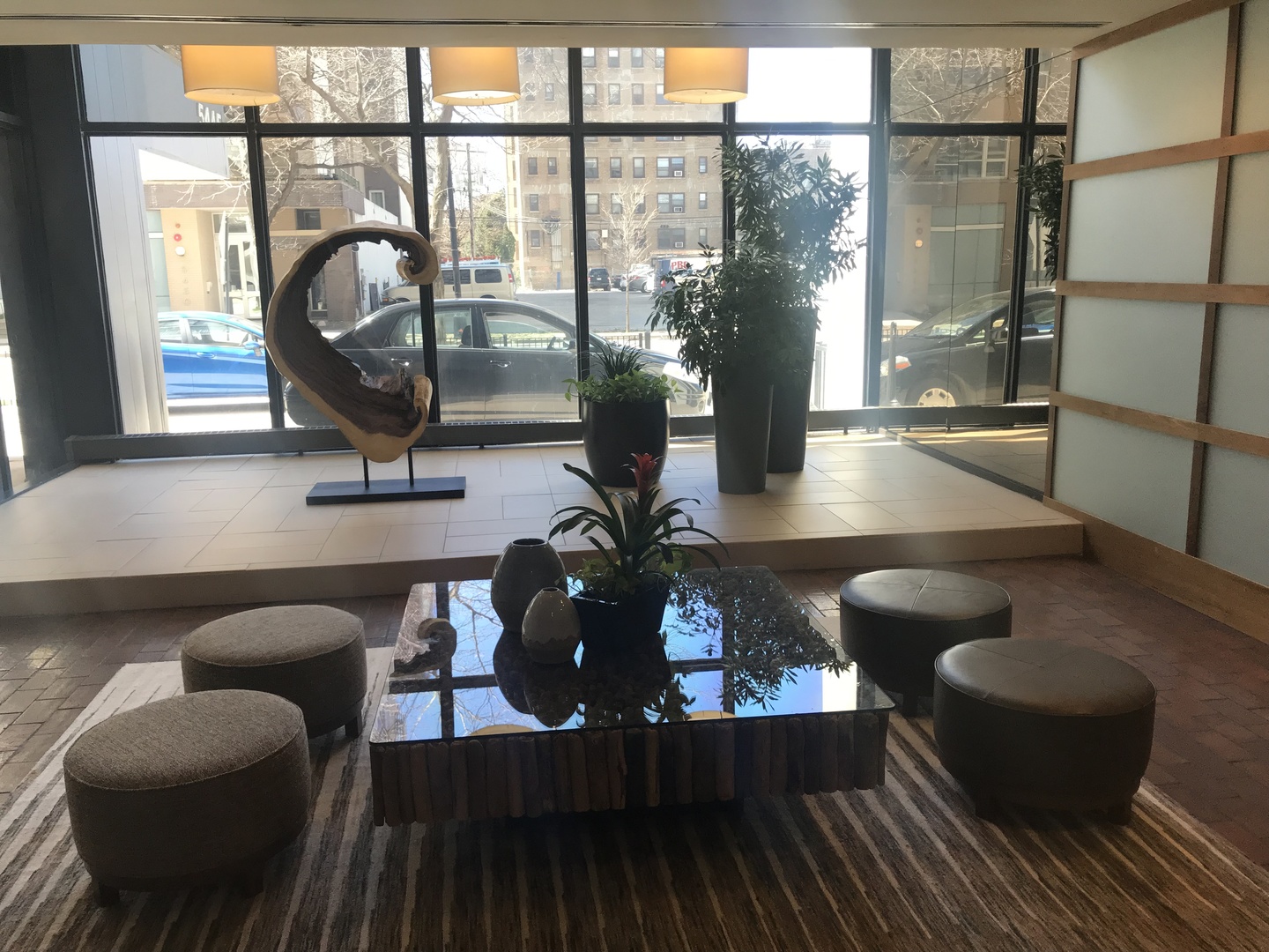 5445 North Sheridan Road, Unit 2504 Chicago, IL 60640 - Photo 30 of 37 a living room with furniture large window and wooden floor