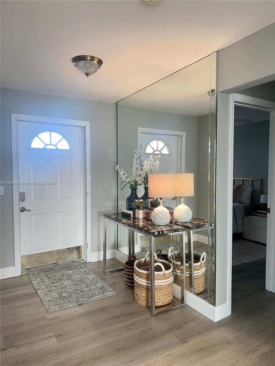 300 E Circle Jupiter, FL 33458 - Photo 3 of 28 a view of a living room and dining room