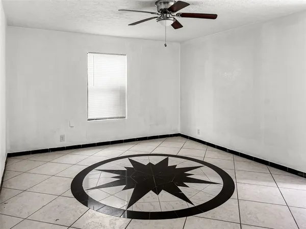 a view of a room with a sink and a window