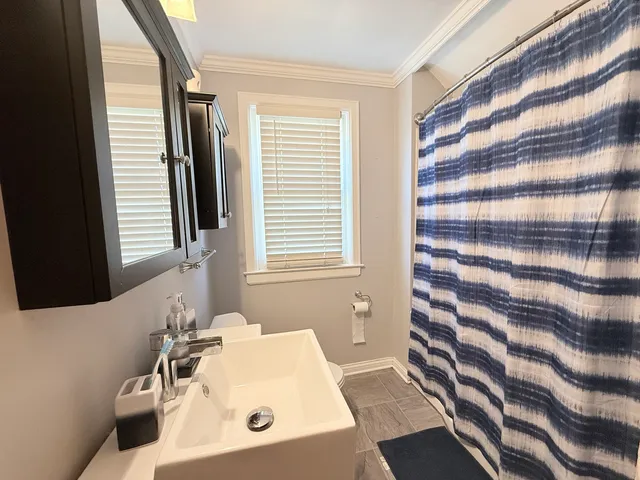 a bathroom with a sink and a bathtub