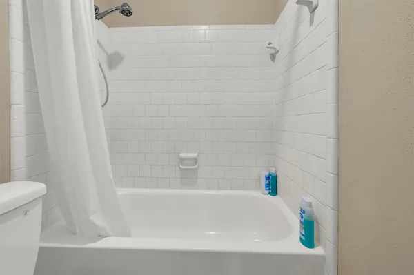 a bathroom with a bathtub