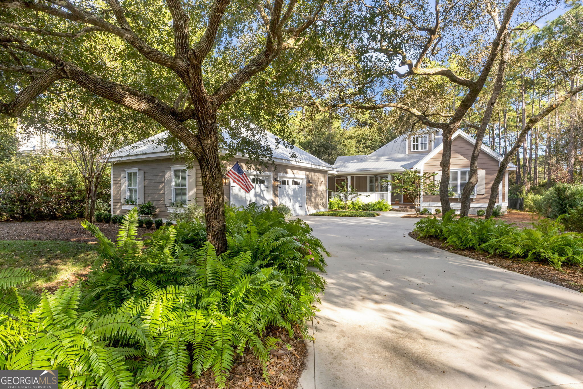 105 Spartina Court St. Marys, GA 31558 - Photo 1 of 95 a front view of a house with garden