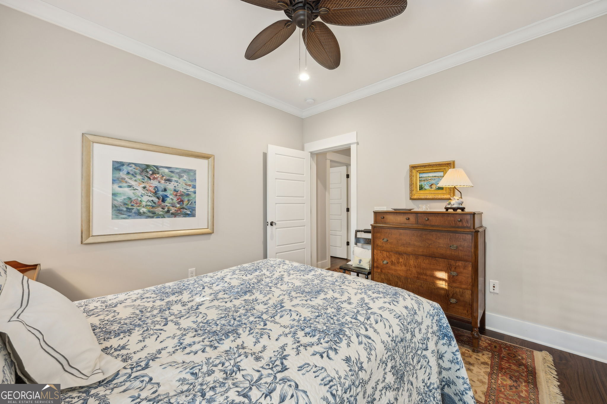 105 Spartina Court St. Marys, GA 31558 - Photo 45 of 95 a bedroom with a bed and wooden floor