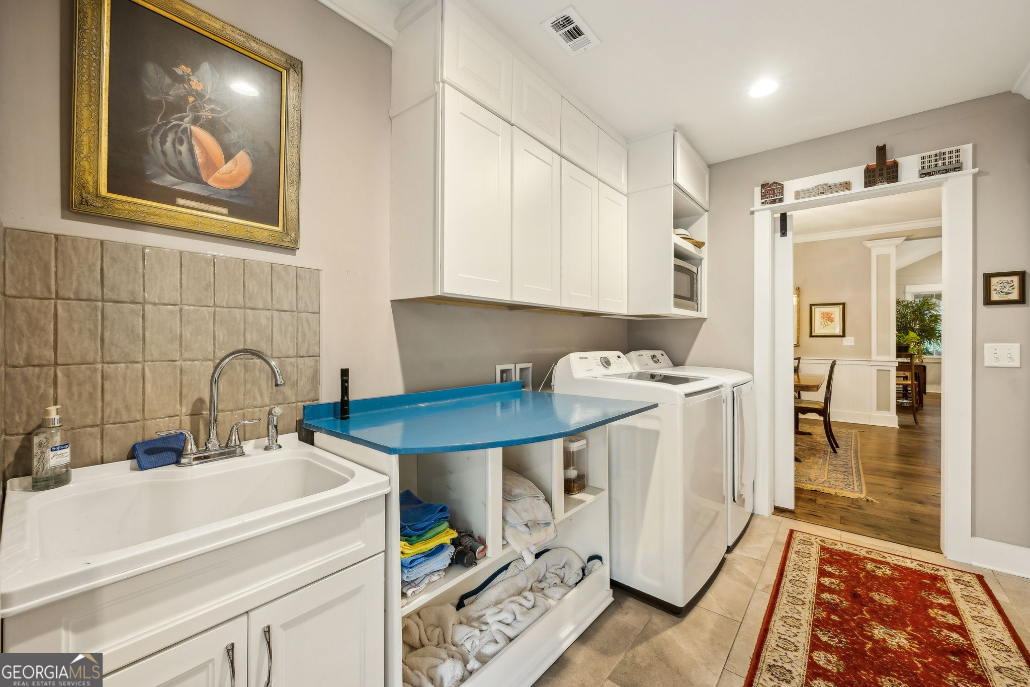 105 Spartina Court St. Marys, GA 31558 - Photo 47 of 95 a kitchen with a sink cabinets and wooden floor
