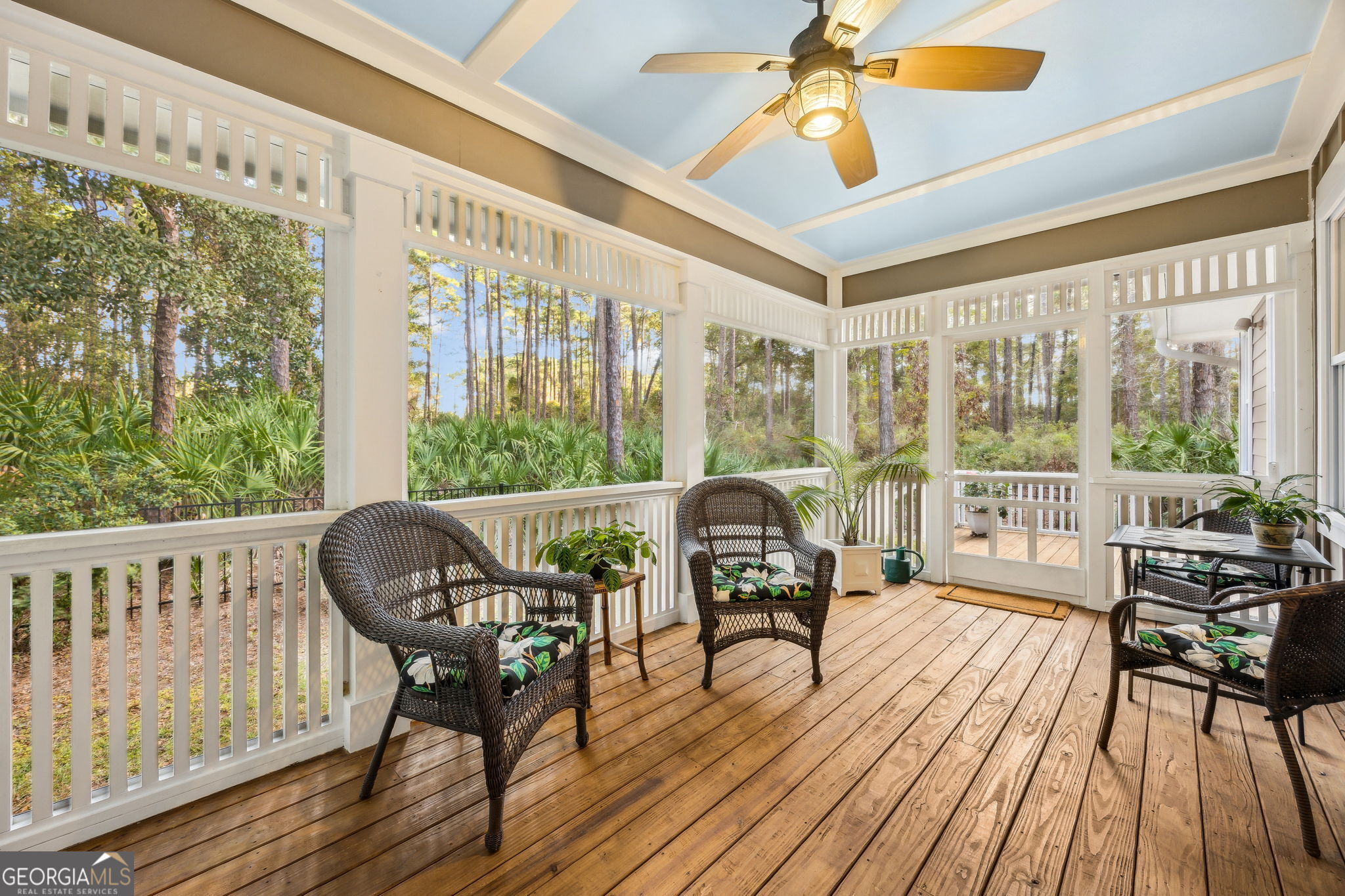 105 Spartina Court St. Marys, GA 31558 - Photo 48 of 95 a balcony with wooden floor and outdoor seating