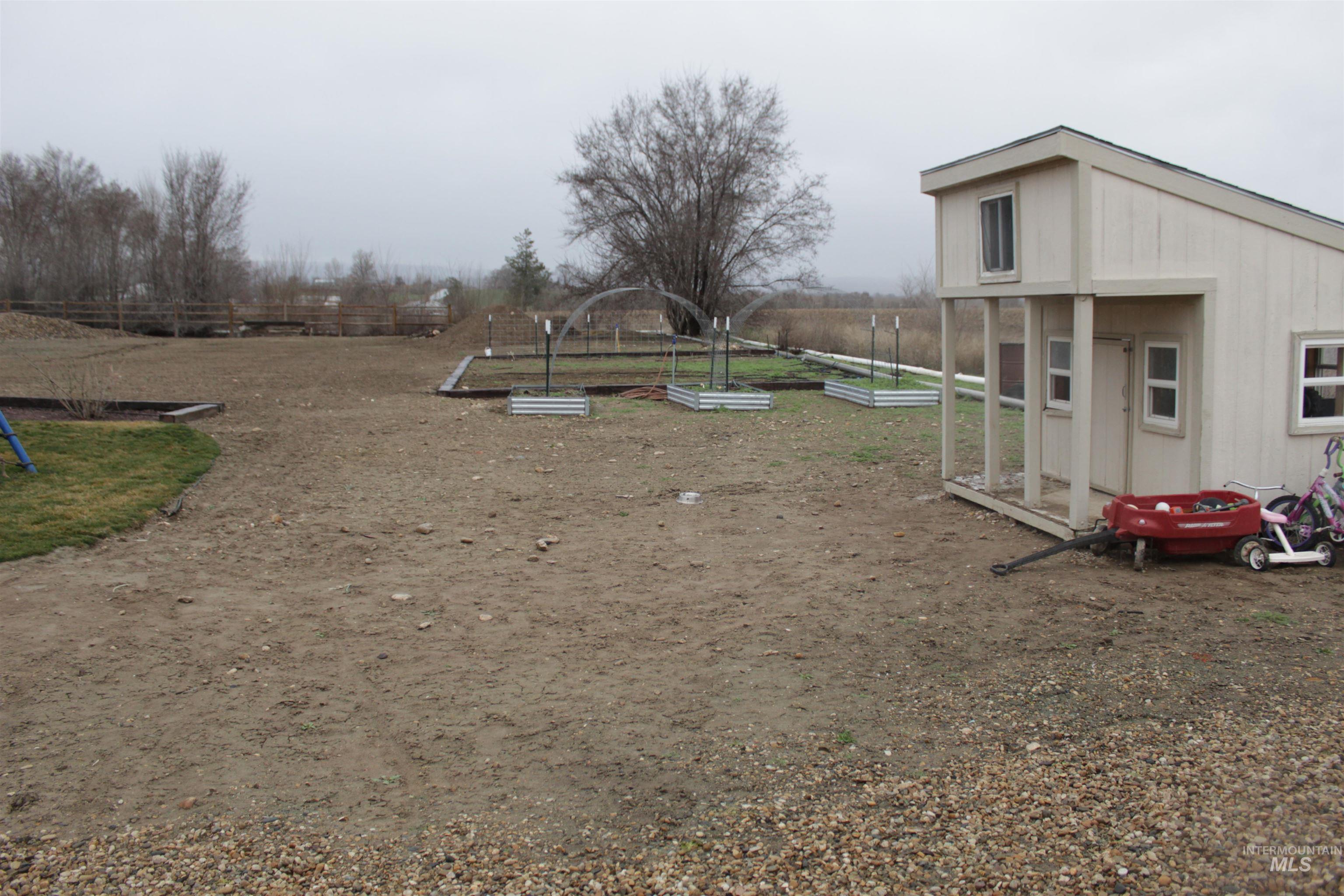 27520 Pearl Road Parma, ID 83660 - Photo 24 of 29 View of yard with a garden