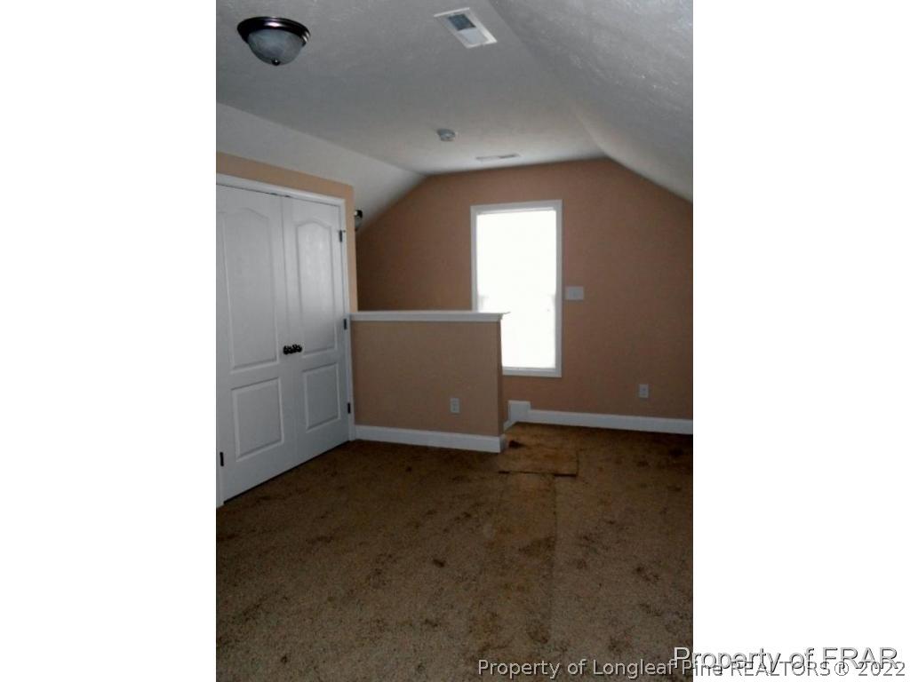 3140 Thrower Road Hope Mills, NC 28348 - Photo 11 of 23 a view of an empty room with a window