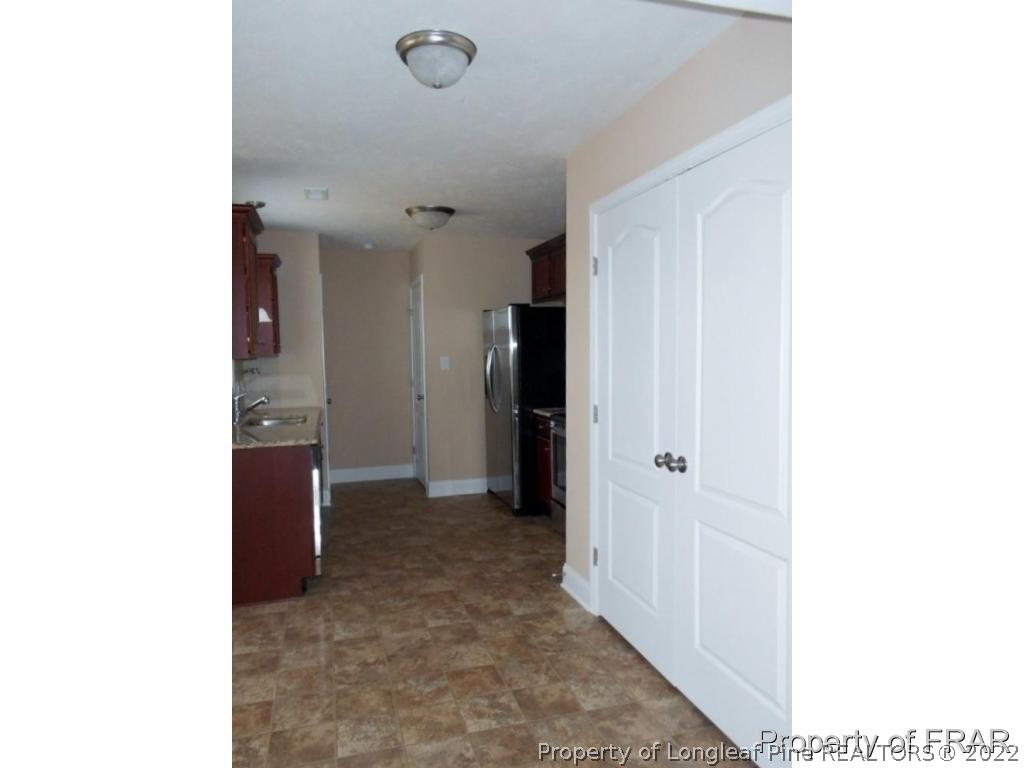 3140 Thrower Road Hope Mills, NC 28348 - Photo 7 of 23 a view of a hallway with closet
